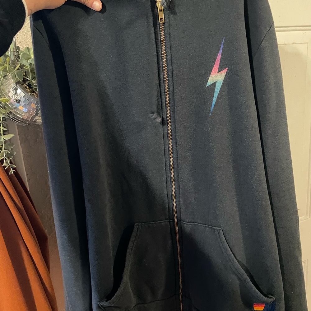 Aviator Nation Dark Hoodie with Colorful Lightning Bolt